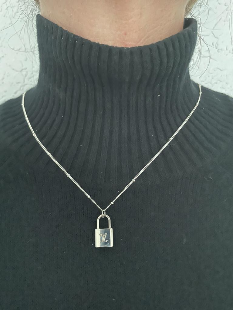 AUTHENTIC LOUIS VUITTON SILVERTONE ZIPPER PULL PADLOCK PENDANT NECKLACE.