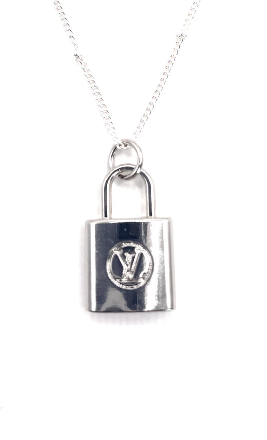 AUTHENTIC LOUIS VUITTON SILVERTONE ZIPPER PULL PADLOCK PENDANT NECKLACE.