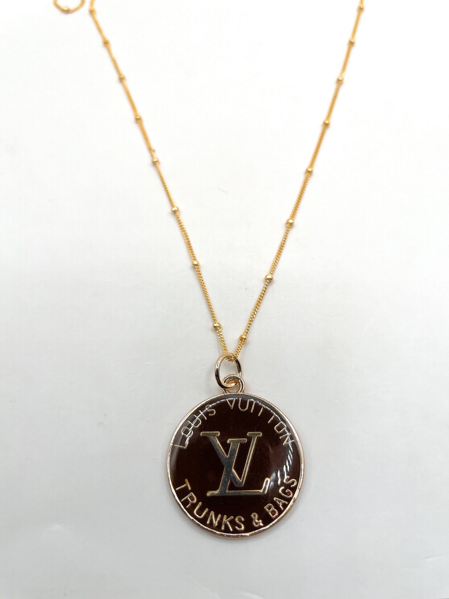 AUTHENTIC LOUIS VUITTON CHOCOLATE BROWN AND GOLD ZIPPER PULL BUTTON NECKLACE