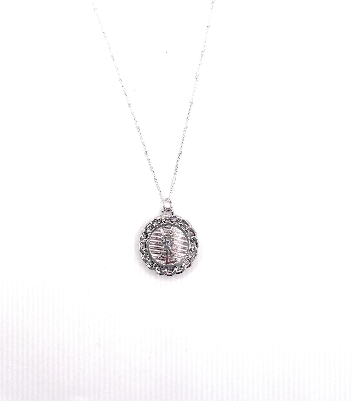 AUTHENTIC YSL SILVER TONE BUTTON NECKLACE