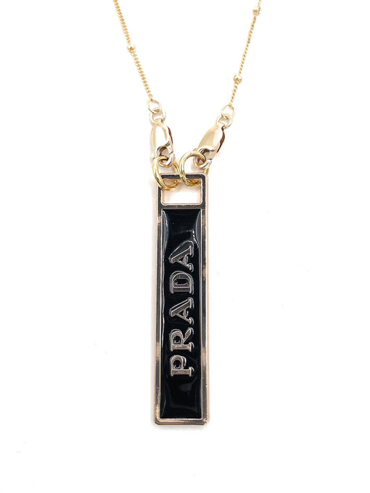 AUTHENTIC PRADA BLACK AND GOLD ZIPPER PULL BUTTON NECKLACE