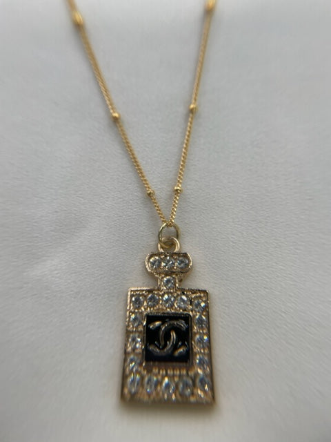 BLACK & GOLD-TONE RHINESTONE CHANEL VINTAGE No 5 PERFUME BOTTLE CHARM NECKLACE